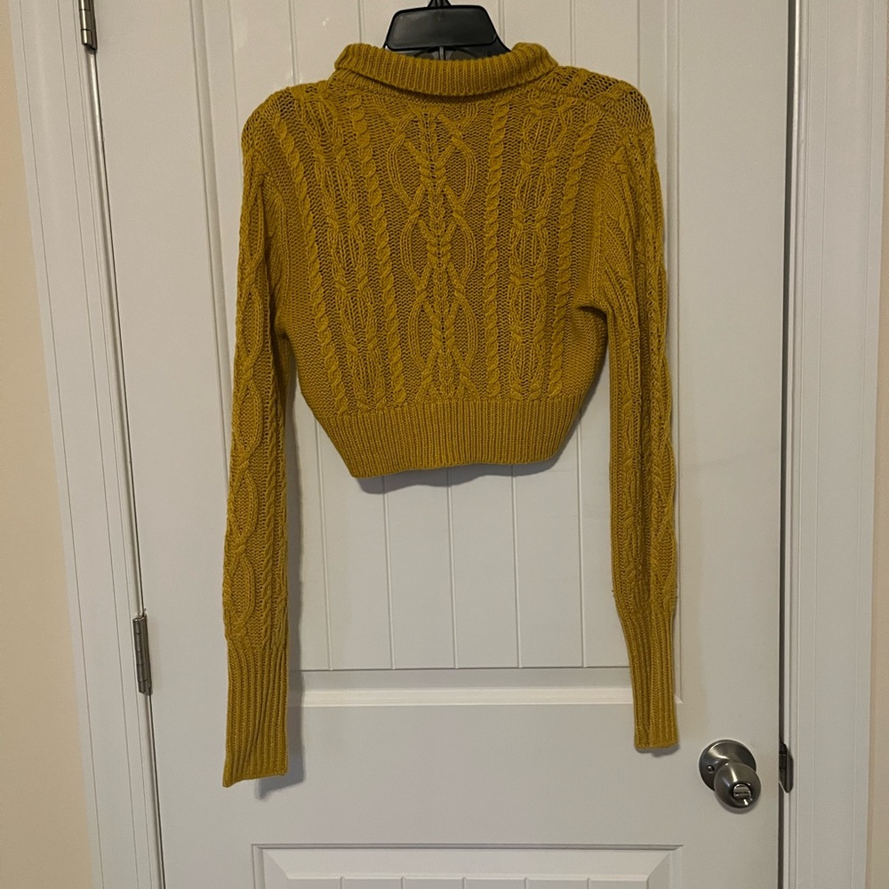 Gold, cropped turtleneck sweater
